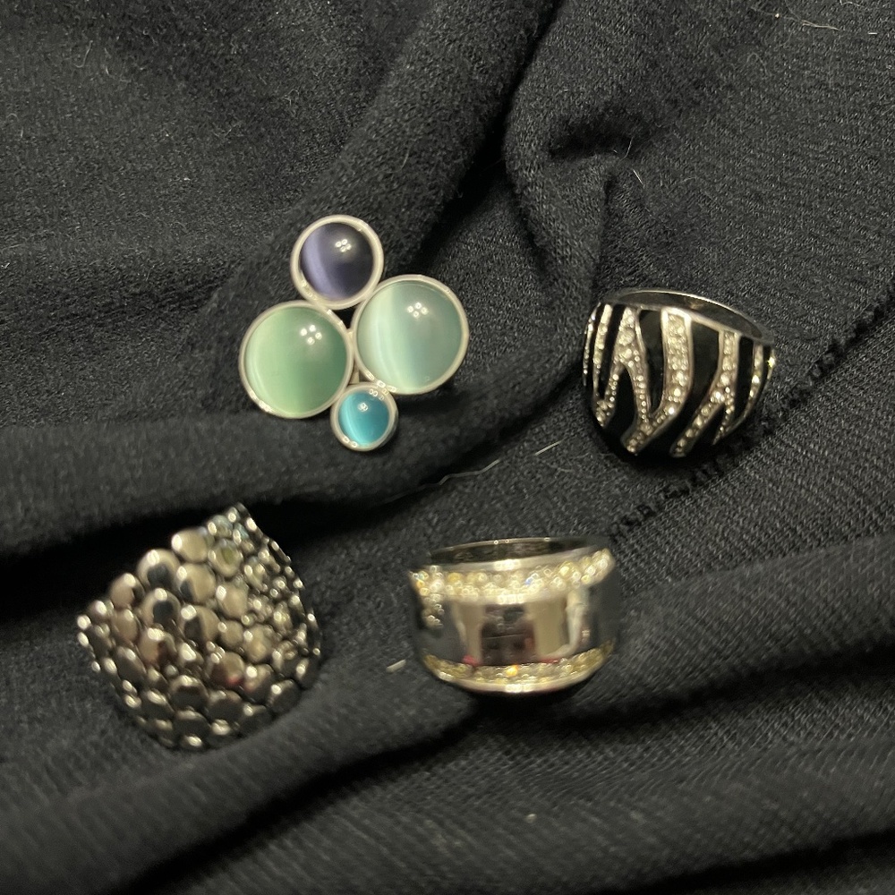 4 beautiful silver tone statement rings